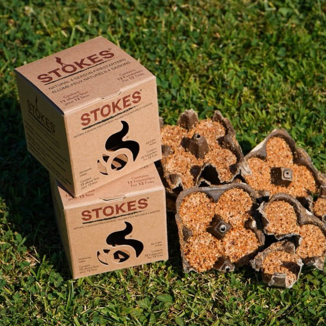 STOKES boxes and firestarters on the grass