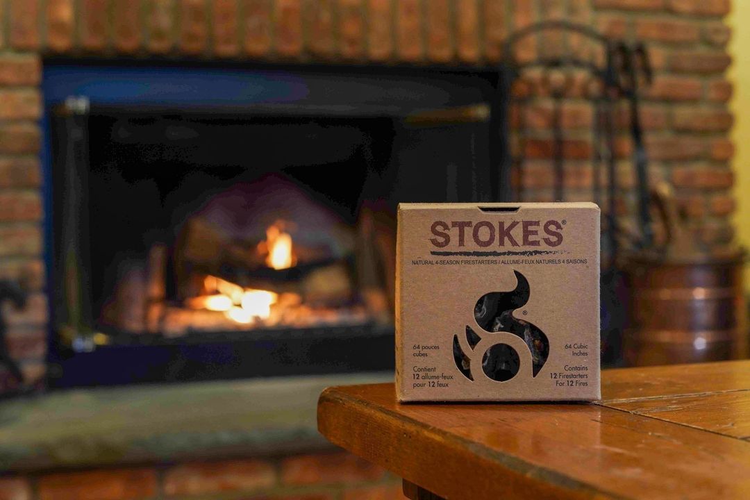 STOKES box beside a fireplace